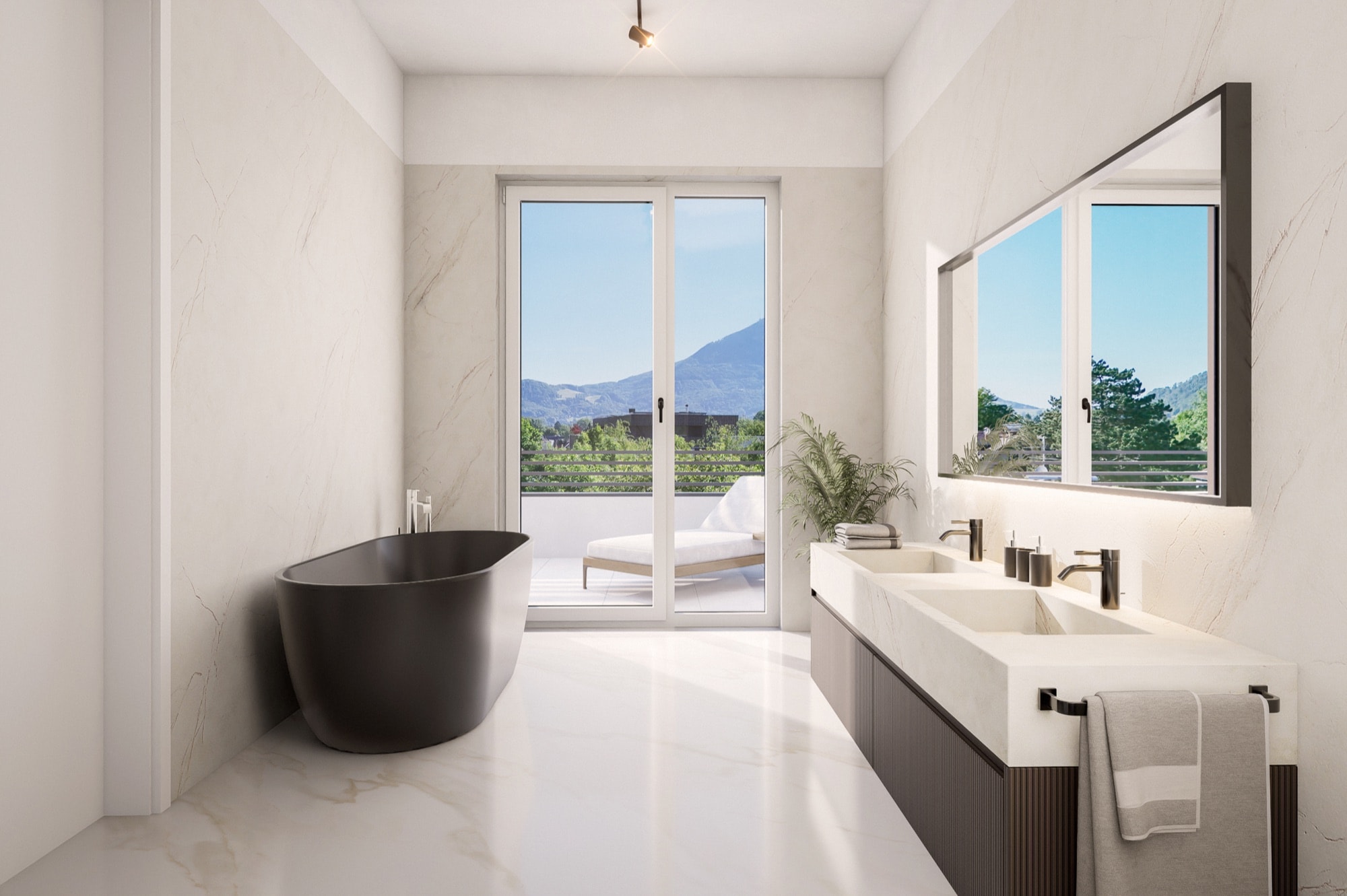 Badezimmer mit freistehender Badewanne und Bergblick